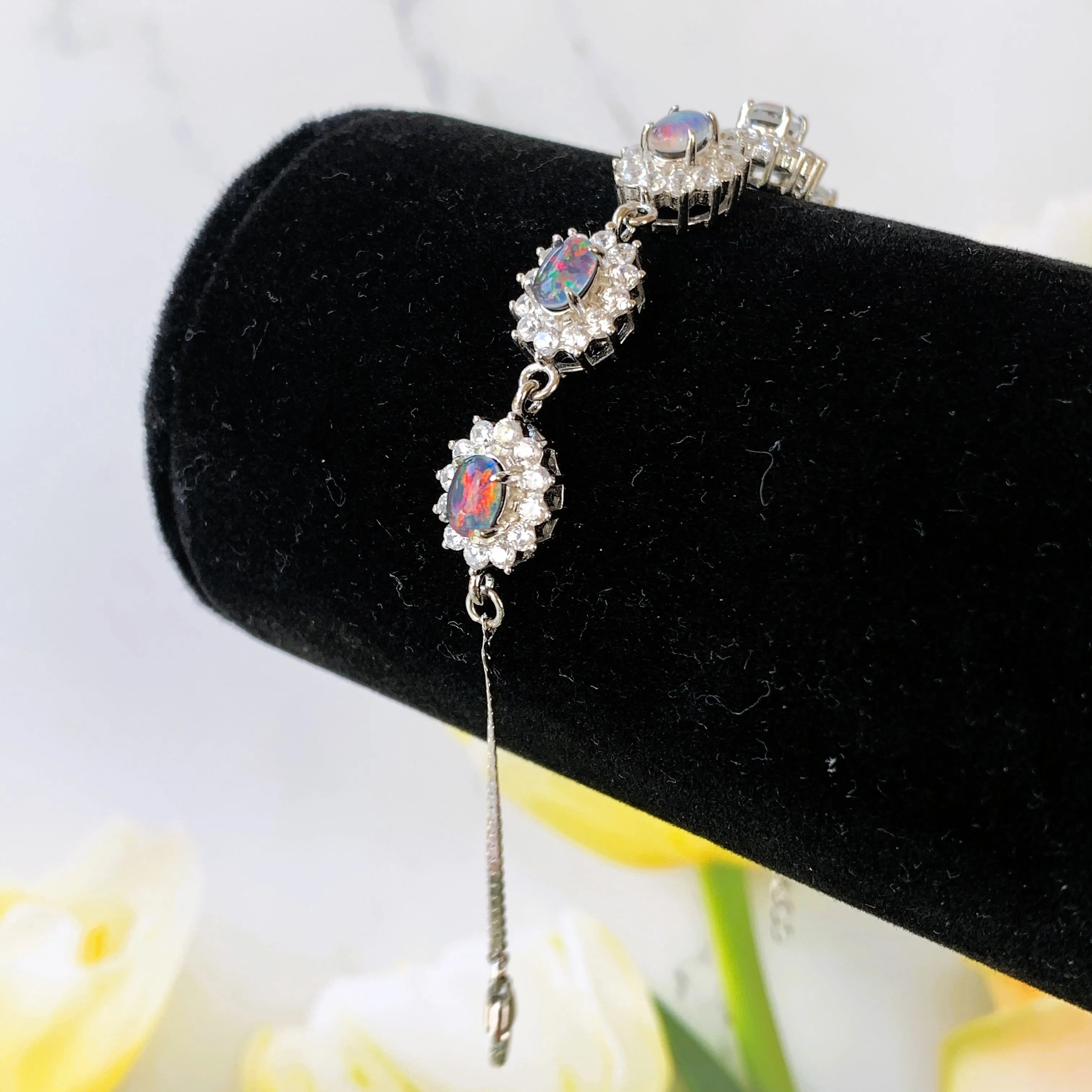 Australian Triplet Opals surrounded by cubic zirconia bracelet set in Sterling Silver