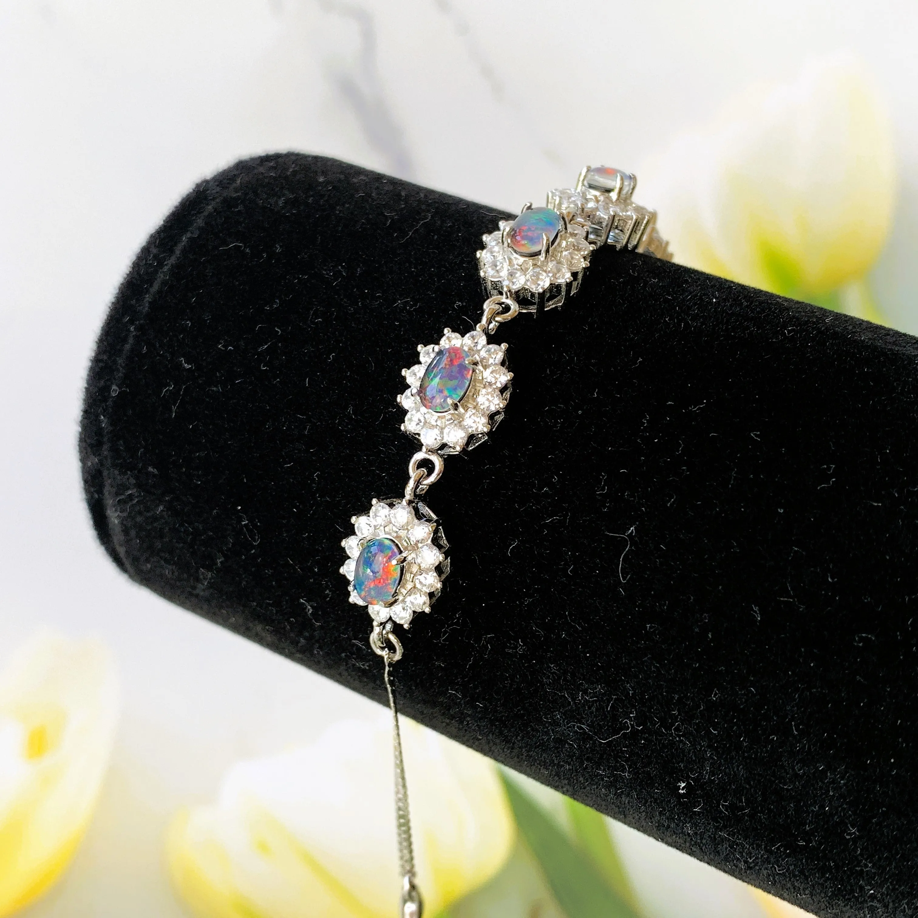 Australian Triplet Opals surrounded by cubic zirconia bracelet set in Sterling Silver