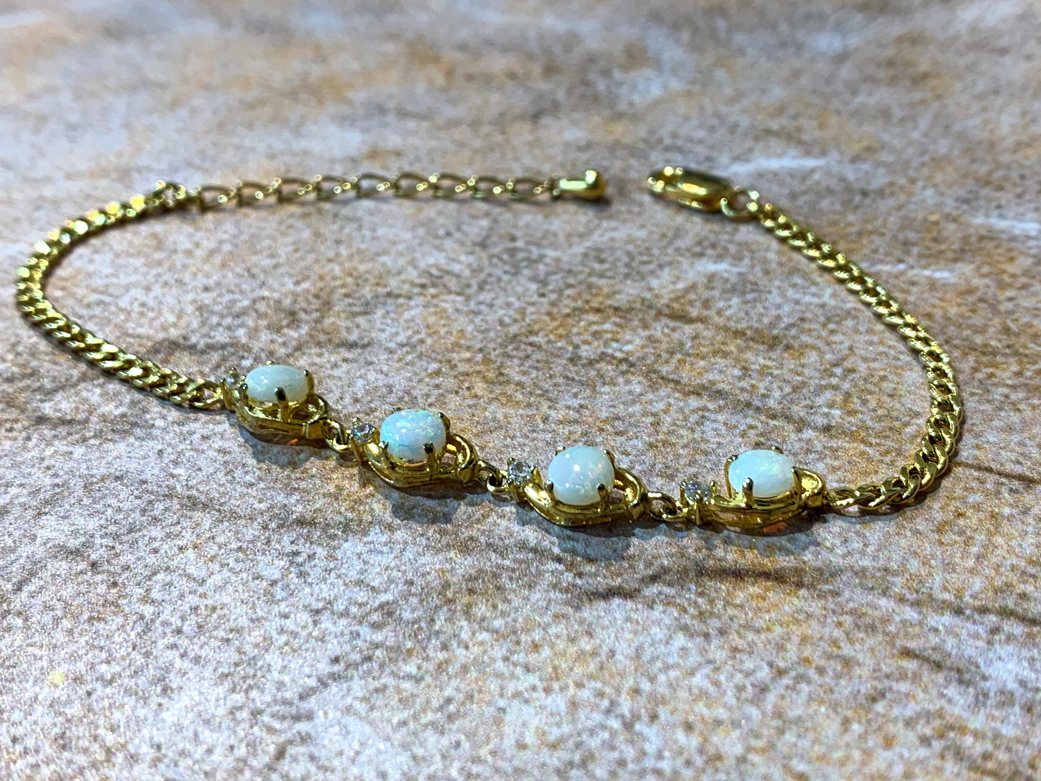 Gold Plated Silver 5mm White Opal round and crystal bracelet