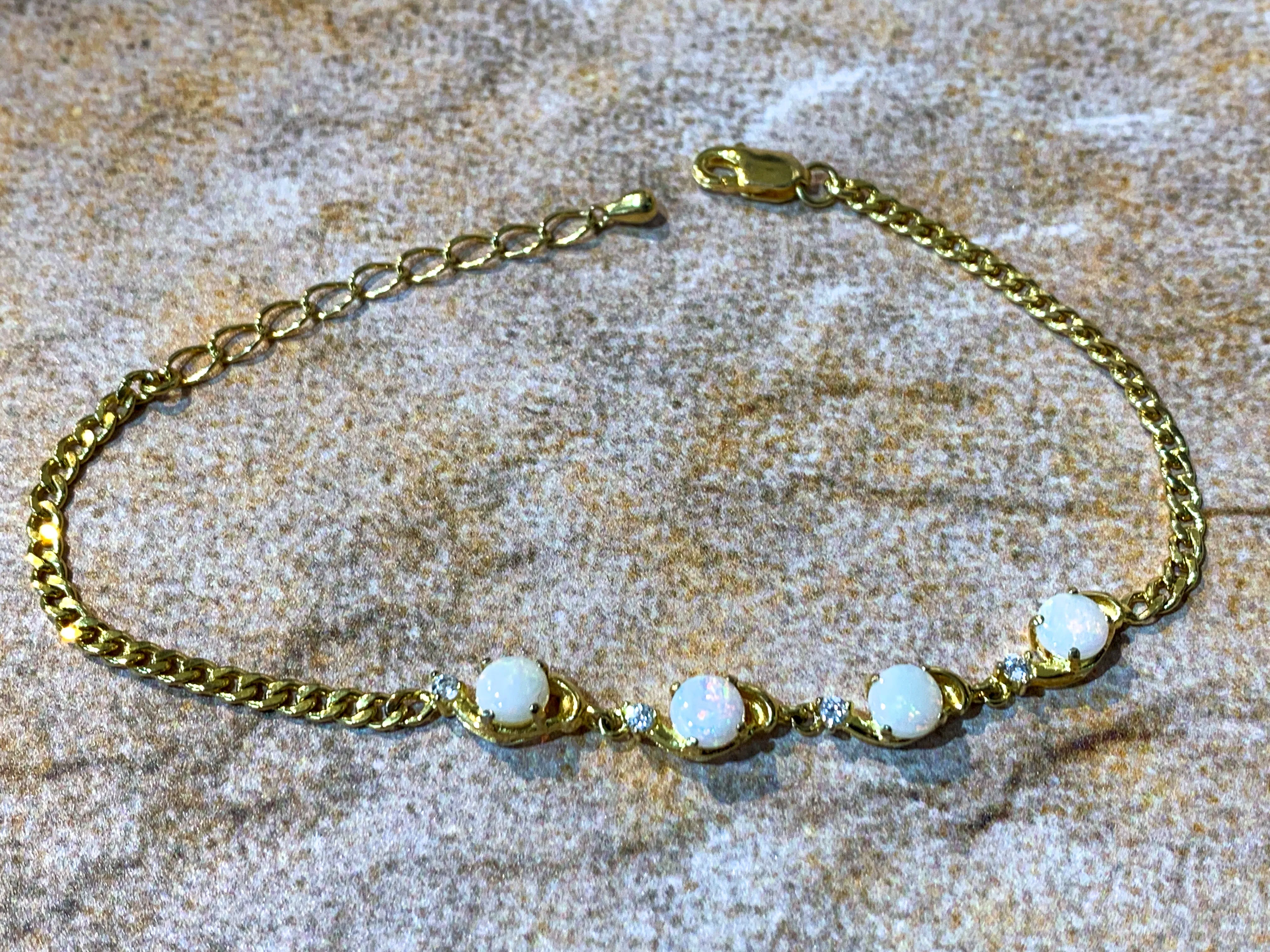 Gold Plated Silver 5mm White Opal round and crystal bracelet